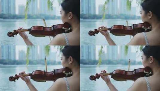 女孩子演奏拉小提琴高清在线视频素材下载