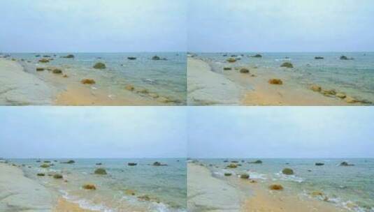 海边巨石礁石滩海滩高清在线视频素材下载