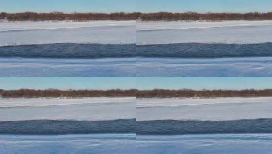 呼伦贝尔冬季湿地河流雪景丛林光影高清在线视频素材下载