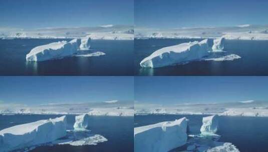 巨大的蓝色冰山漂移北冰洋晴朗晴朗的天空高清在线视频素材下载