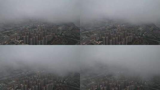 云雾笼罩下的城镇航拍高清在线视频素材下载
