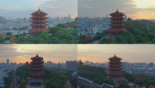 在清晨朝霞中环绕武汉地标黄鹤楼飞行高清在线视频素材下载