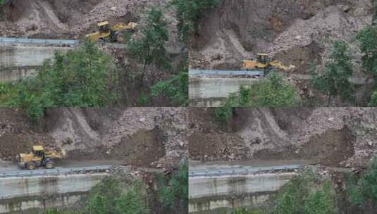 雨季泥水流塌方路段工程车抢修高清在线视频素材下载