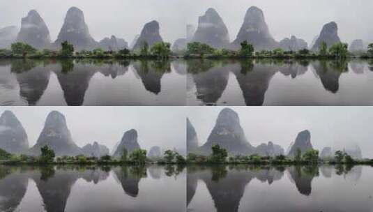 雨天湖景倒映绿树青山的宁静画面高清在线视频素材下载