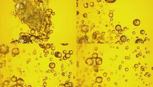 黄色液体中产生大量气泡的画面高清在线视频素材下载