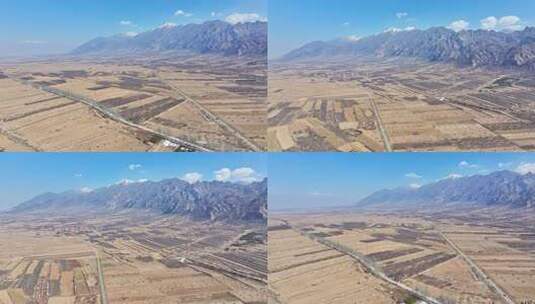 航拍河北蔚县小五台山积雪乡村公路雪山田野高清在线视频素材下载