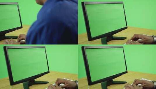 拍摄人在有绿幕的电脑前打字高清在线视频素材下载
