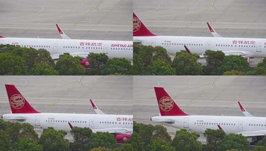 吉祥航空飞机在浦东机场跑道滑行高清在线视频素材下载