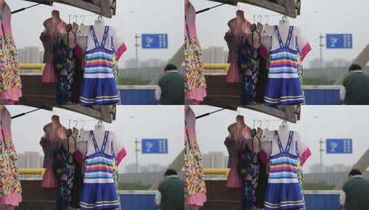 海边小贩卖的五颜六色的夏装泳衣高清在线视频素材下载