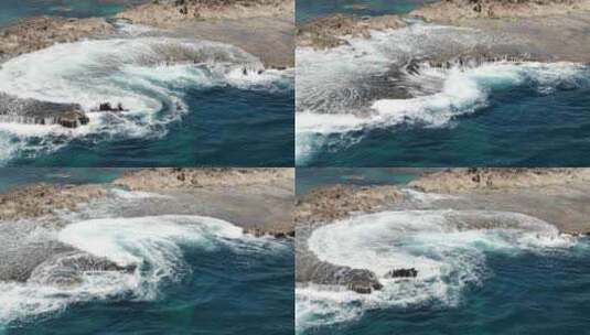 航拍海浪拍打海岸礁石岩石大海海边高清在线视频素材下载