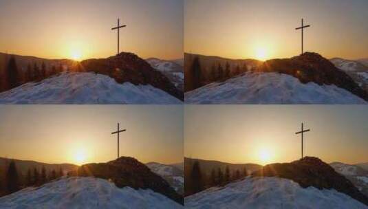 雪岩上的基督教十字架高清在线视频素材下载