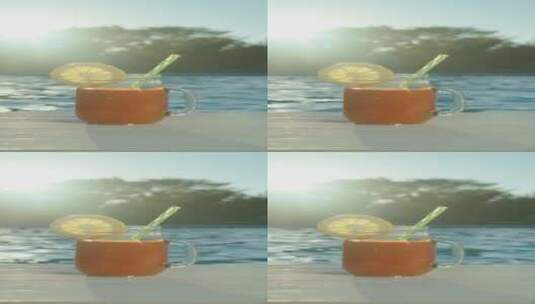 竖屏、阳光下的橙汁高清在线视频素材下载