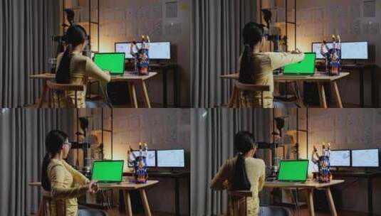 女孩在绿屏电脑前伸懒腰高清在线视频素材下载
