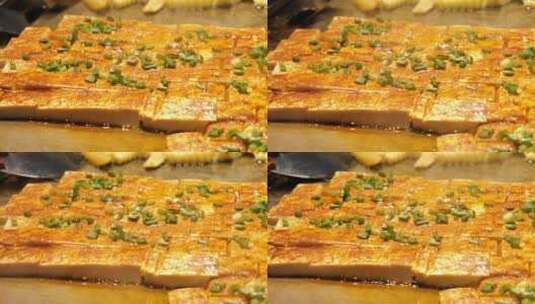 美味的夜市小吃铁板豆腐高清在线视频素材下载