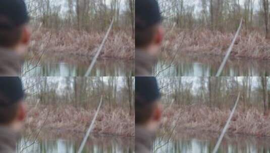 在湖边钓鱼的男人高清在线视频素材下载
