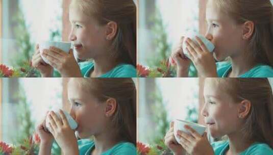 在窗边喝茶的女孩高清在线视频素材下载