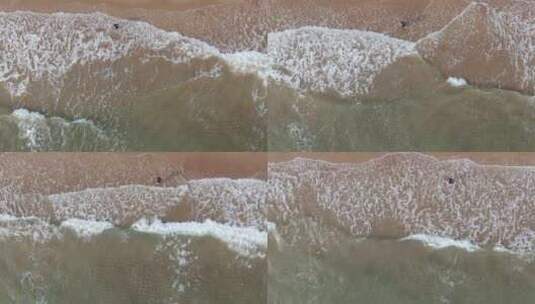 俯拍大海海浪拍打沙滩高清在线视频素材下载