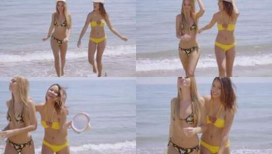 穿着比基尼的年轻女性在海里嬉戏高清在线视频素材下载