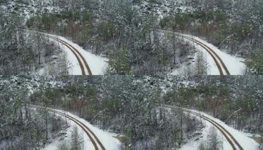 航拍春季极端天气降雪山林公路雾凇高清在线视频素材下载