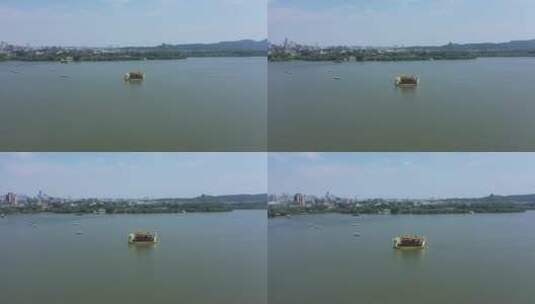 航拍杭州西湖上的游船高清在线视频素材下载