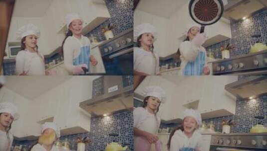 姐妹俩在厨房翻饼高清在线视频素材下载