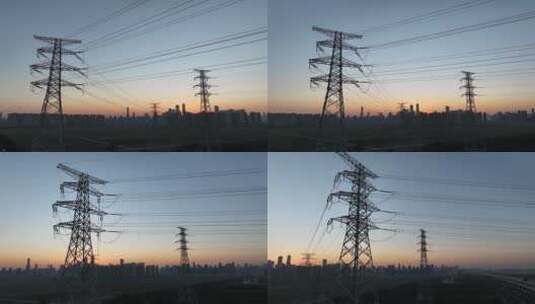 夕阳下高压电力传输线电塔剪影高清在线视频素材下载