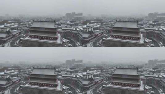 陕西省西安市正在下雪的西安鼓楼雪景景观高清在线视频素材下载