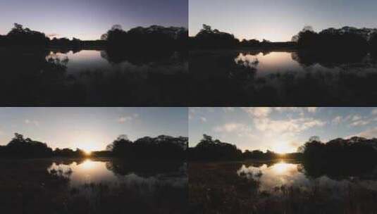 清晨湖泊日出延时水天一色湖景高清在线视频素材下载
