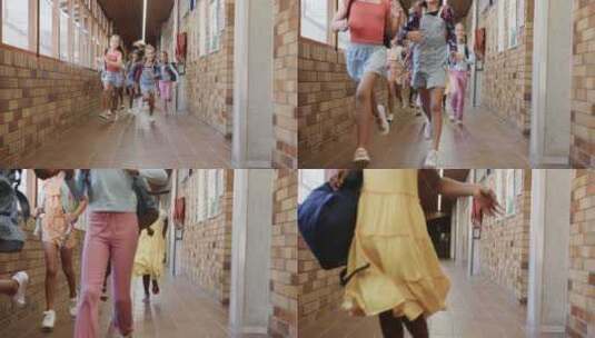 小学走廊里背着书包的快乐多样化女学生高清在线视频素材下载