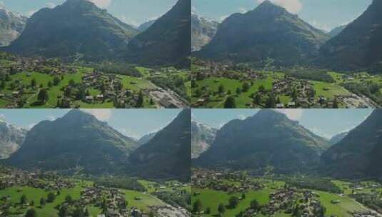 格林德沃尔德和瑞士滑翔伞的鸟瞰图高清在线视频素材下载
