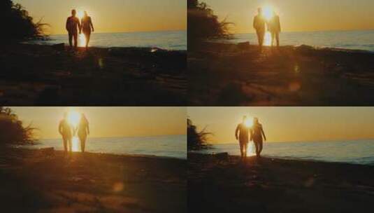 夕阳海滩上牵手漫步的夫妇高清在线视频素材下载