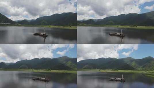 航拍初夏蓝天白云的湖北神农架大九湖3号湖高清在线视频素材下载