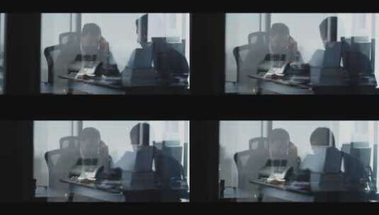 男人在办公室用笔记本工作高清在线视频素材下载