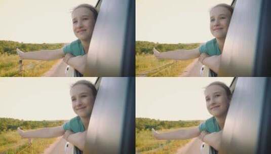 女孩趴在车窗上看风景高清在线视频素材下载