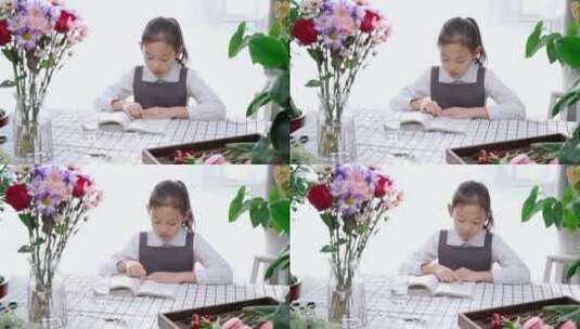 午后在阳光下读书的中国女孩高清在线视频素材下载