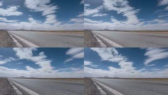 戈壁荒漠公路在逆光蓝天下的延时高清在线视频素材下载