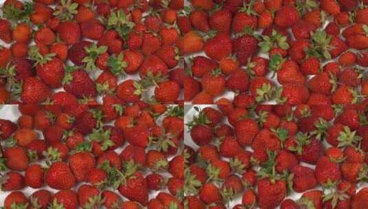 有机红裂纹未洗净草莓浆果分离在白色背景高清在线视频素材下载