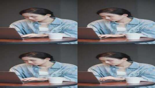 咖啡馆休闲办公学习的年轻亚洲女性高清在线视频素材下载