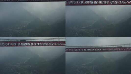 航拍雨雾中的矮寨大桥和德夯大峡谷风光高清在线视频素材下载