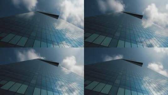 玻璃建筑物上反射天空高清在线视频素材下载
