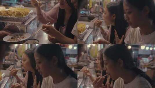 首尔街头吃小吃的女人高清在线视频素材下载