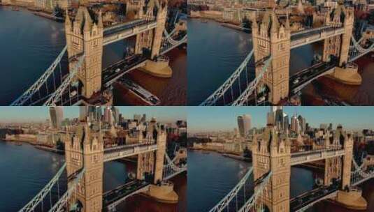 城市航拍游轮在伦敦桥行驶过摩天大楼日出高清在线视频素材下载