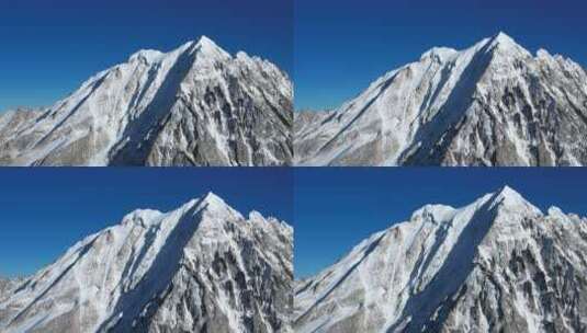 航拍川西蓝天下的雅拉雪山特写高清在线视频素材下载