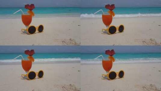 海滩上的果汁和太阳镜高清在线视频素材下载