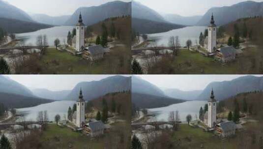 斯洛文尼亚博辛吉湖上桥梁和教堂的无人机景观高清在线视频素材下载