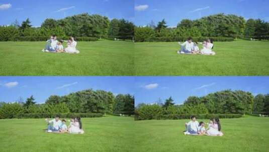 健康快乐 一家人在草地欢乐的玩耍高清在线视频素材下载