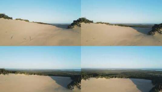 俯瞰卡洛沙吹彩虹海滩A独特的“月光”沙块的高无人机视图高清在线视频素材下载