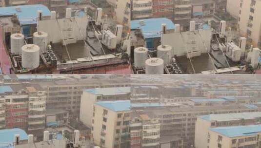 楼顶空调机组水箱通风机发电机组暴雨摇城市高清在线视频素材下载