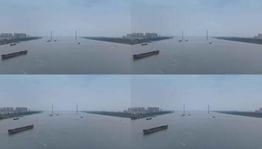 航拍安庆长江大桥与海运集装箱货轮高清在线视频素材下载