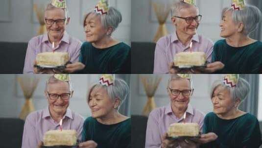 老年夫妇庆祝生日快乐妻子戴节日帽的丈夫穿高清在线视频素材下载